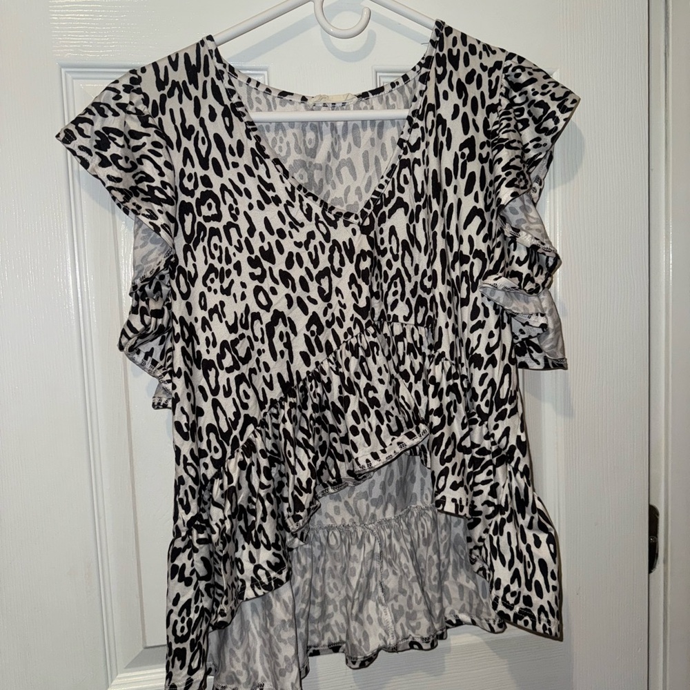 Altar'd State Black and White leopard print blouse.